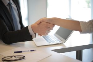 Two Clients Shaking A Hand