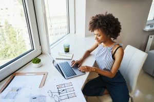 African American female architect working from home